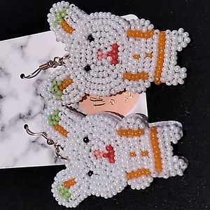 Easter beaded Earrings hypoallergenic bunnies white & pink 2.5 x 1 inch